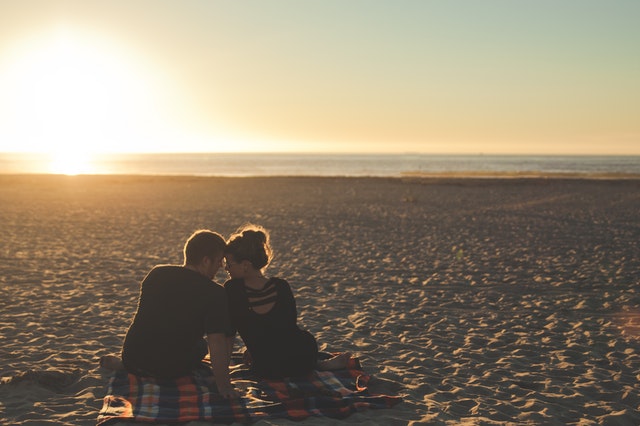 Couple Dating On The Beach